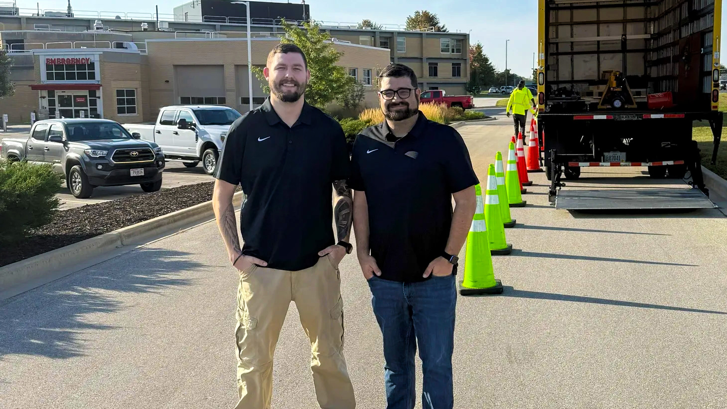 adam_jake two simply finer emplyees in front of a box truck