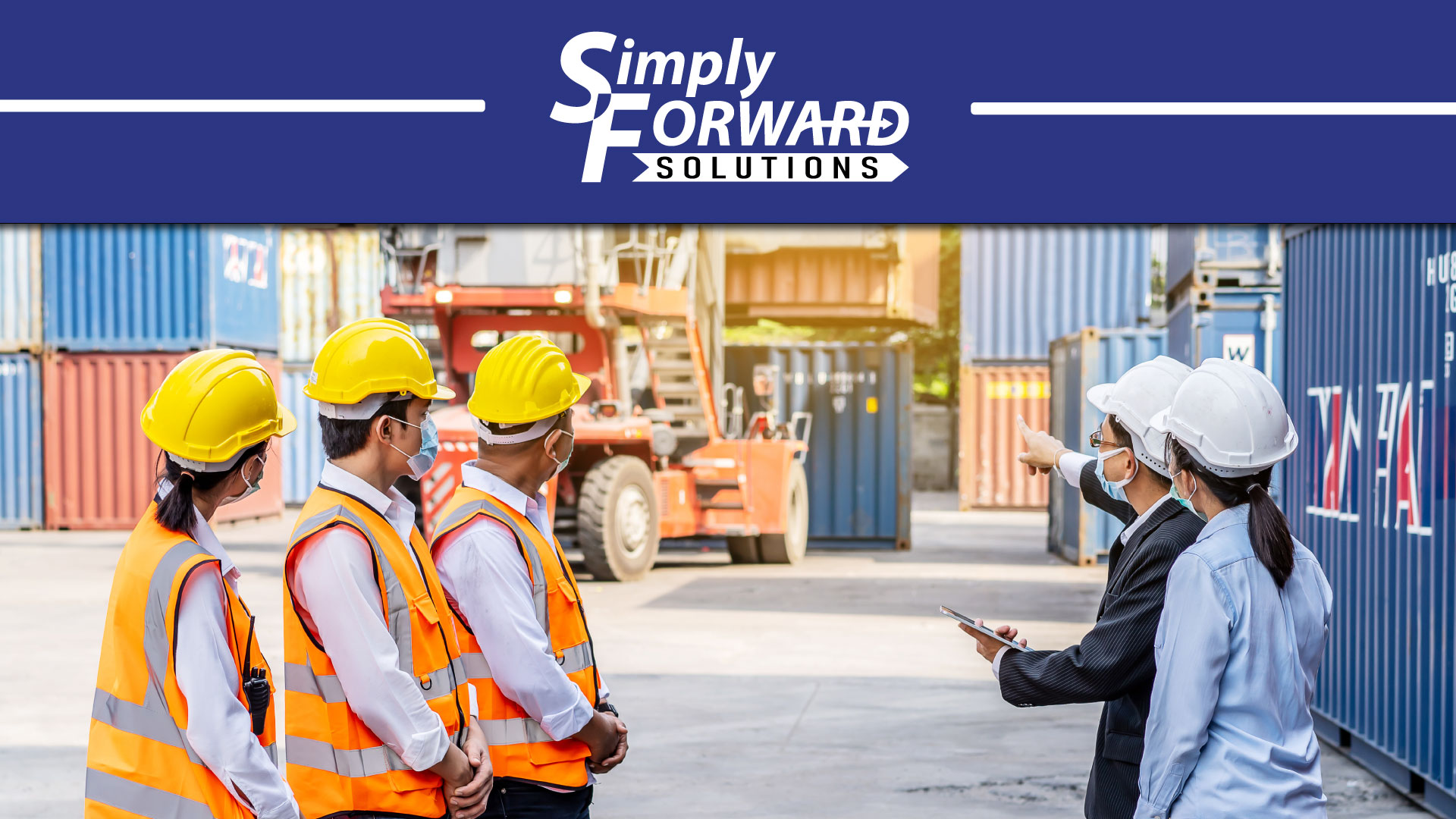 Project managers looking over an operaton with workers.